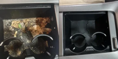 Dirty vehicle center console cup holders with heavy grime and debris before and after interior detailing.